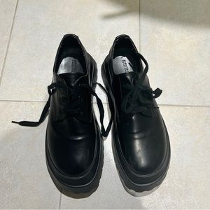 Black leather platform shoes